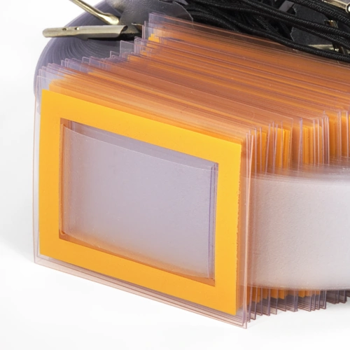 Okienka drukwowane, ramka w kolorze pomarańczowym, pasek 100 µm, gumka tekstylna z metalowymi  końcówkami