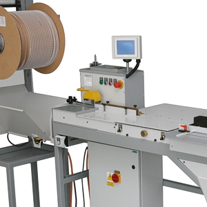 Półautomatyczna maszyna POZ-2 do oprawy bloków i kalendarzy bez zawieszki w spirale zamykane.